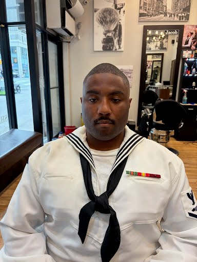 Sharp fade haircut at Deja Vu Barbershop