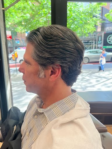 Clean side part haircut at Deja Vu Barbershop